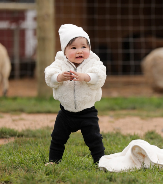 Fur Coat and Beanie in Cream